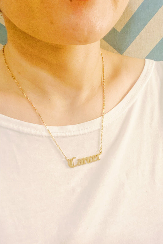 Zodiac Name Necklace Cancer on a person