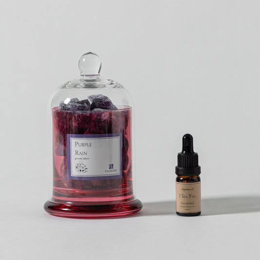 Purple Rain Gemstone Diffuser with I Sea You fragrance oil on white background