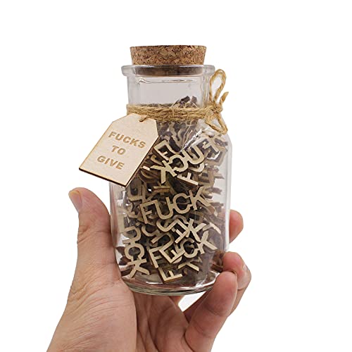 gift jar of fucks in a persons hand for size reference