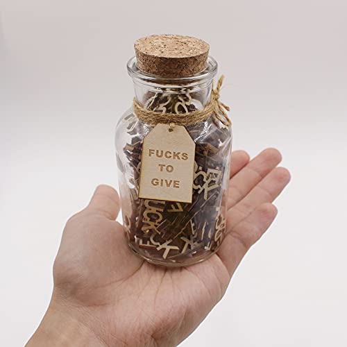 gift jar of fucks in the palm of hand for size reference